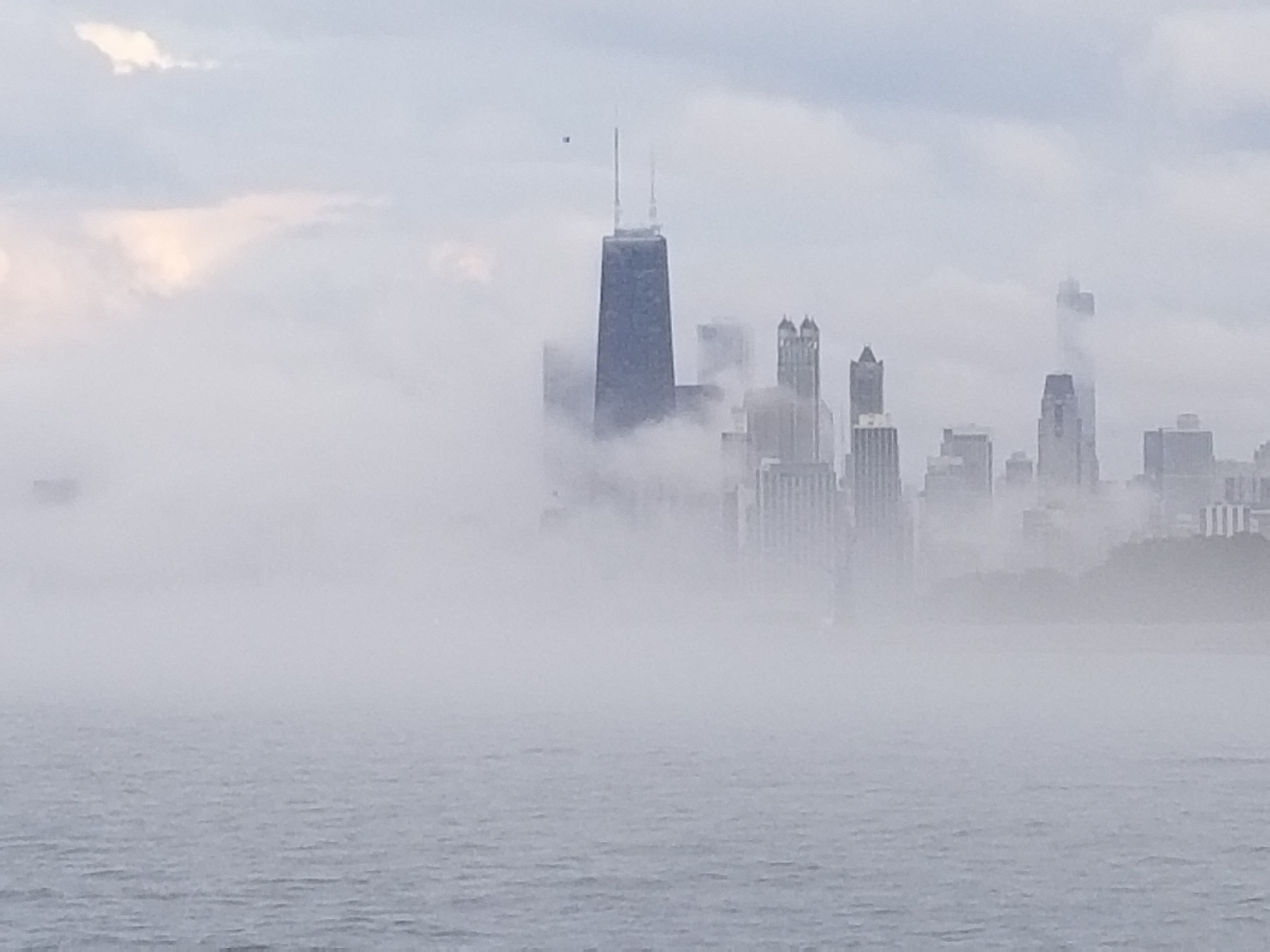 chicago-skyline-in-the-fog-view-from-relent-less-the-great-lakes